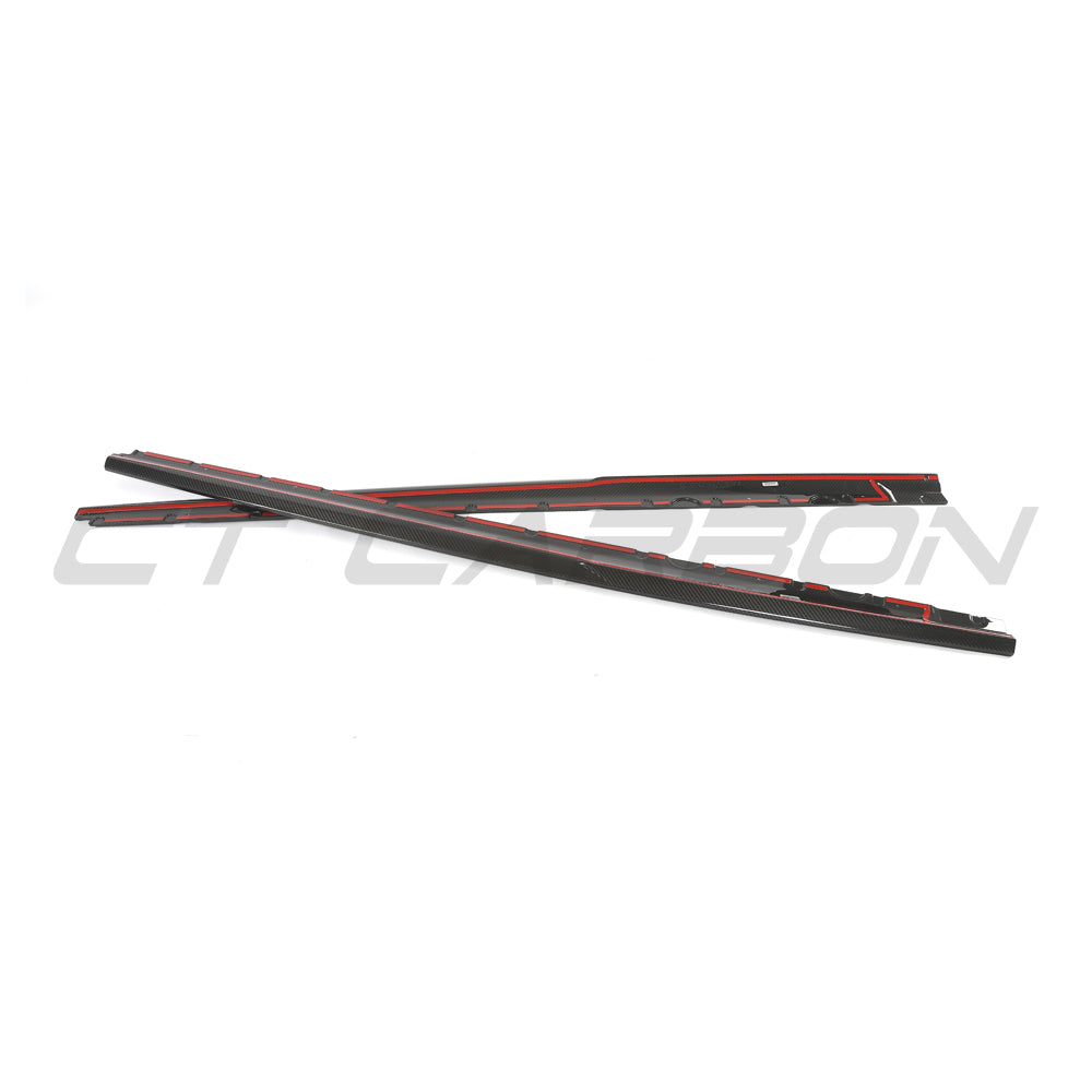 Carbon fibre side skirts for Audi R8 V10 Gen 2.5 by CT Carbon, shown installed on the vehicle's sides.