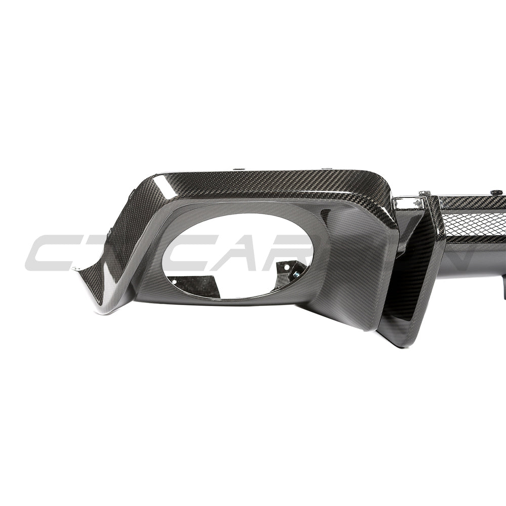 Audi R8 V10 and V10+ Gen 2.5 carbon fibre diffuser by CT Carbon, showcasing sleek aerodynamic design and textured carbon material.