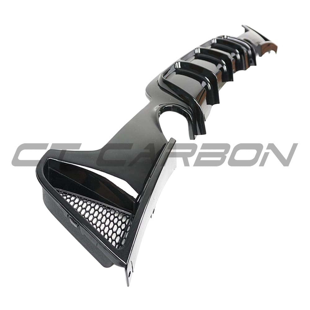 BMW 4 Series F32/F33/F36 CT Carbon gloss black dual exit exhaust diffuser installed on rear of vehicle.