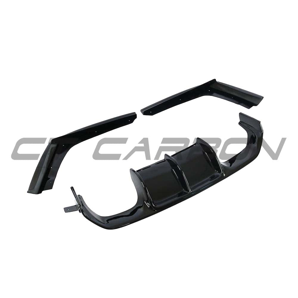 Black V-style diffuser for BMW M3 M4 F80 F82 F83 by CT Carbon, showcasing a glossy finish and aerodynamic design.