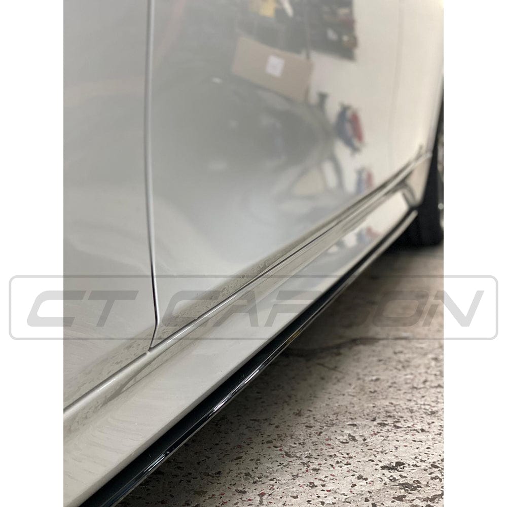 BMW 3 Series F30 gloss black full kit with twin exhaust by CT Carbon, featuring MP style dual exhaust outlets and sleek black finish.
