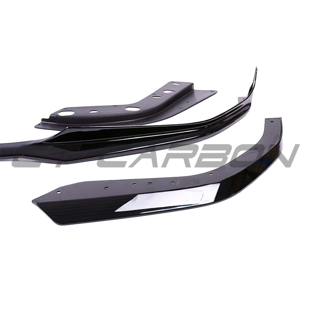 BMW 3 Series G20 gloss black full kit with round exhaust tips by CT Carbon, featuring sleek black finish and MP style design.