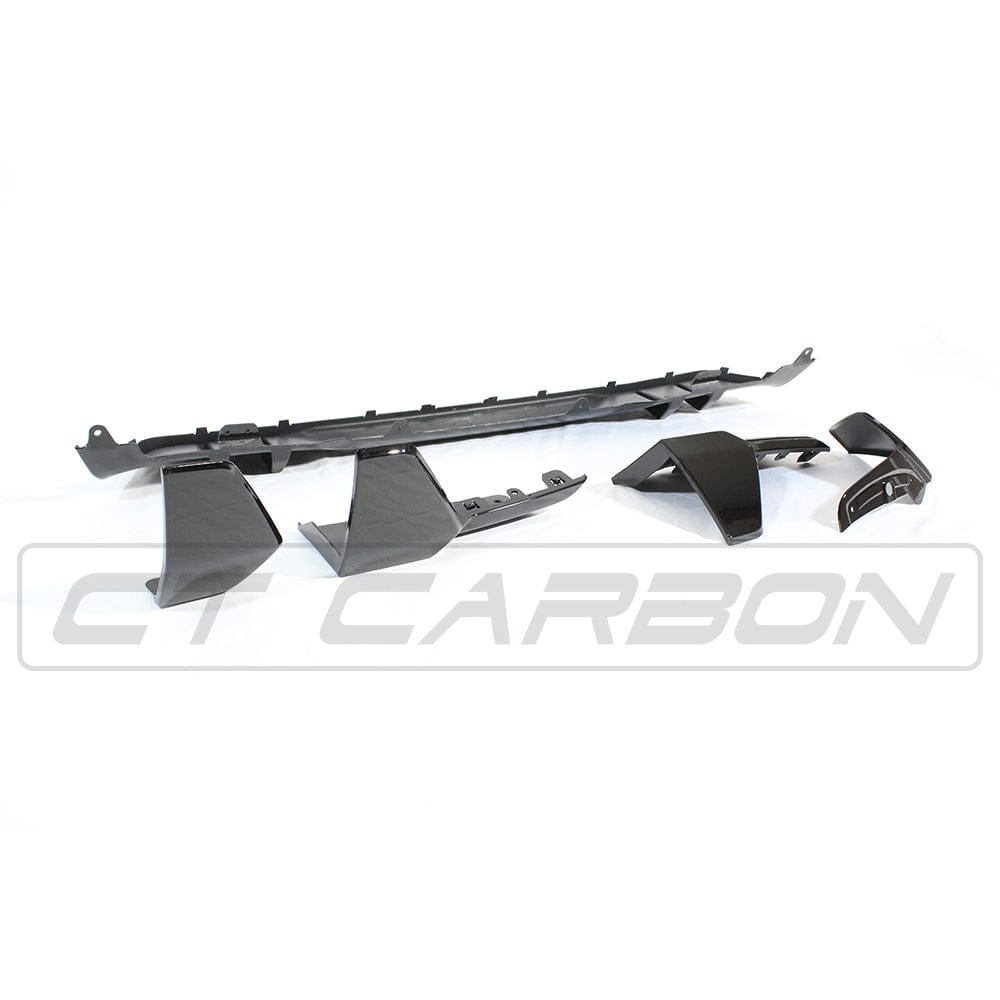 BMW G05 X5 black plastic kit by CT Carbon, MP style, showing a full black exterior vehicle enhancement in the image.