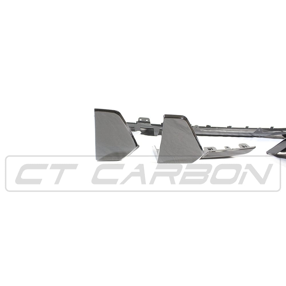 BMW G05 X5 black plastic kit by CT Carbon, MP style, showing full kit components for exterior enhancement.