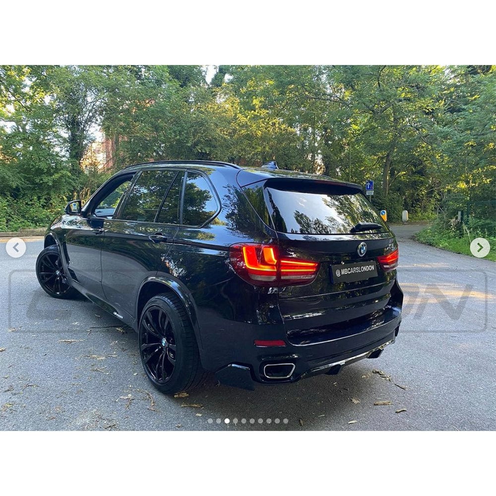 BMW X5 F15 2014-2018 gloss black kit by CT Carbon, full exterior styling kit with black accents for a sleek look