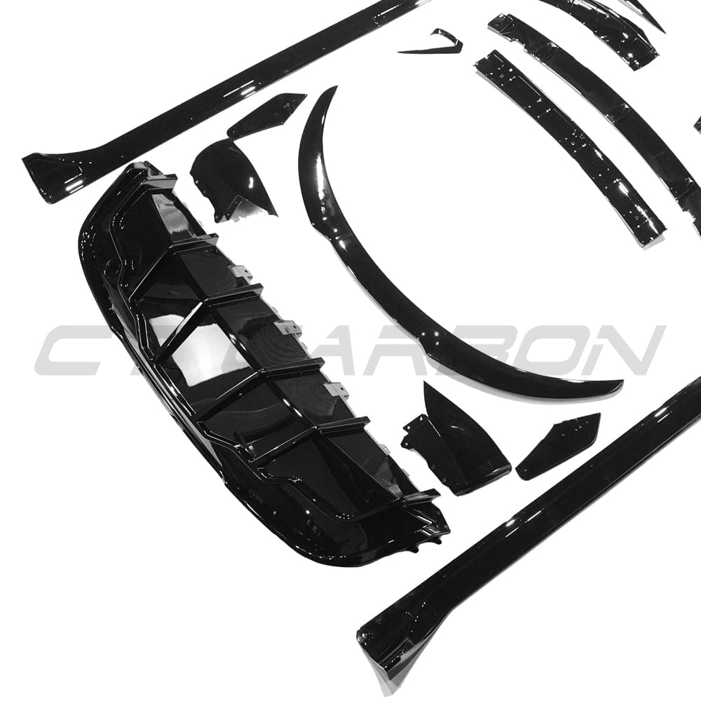 Full gloss black car body kit for Tesla Model Y MK1 2020-2025 by CT Carbon, shown on the vehicle with black accents.