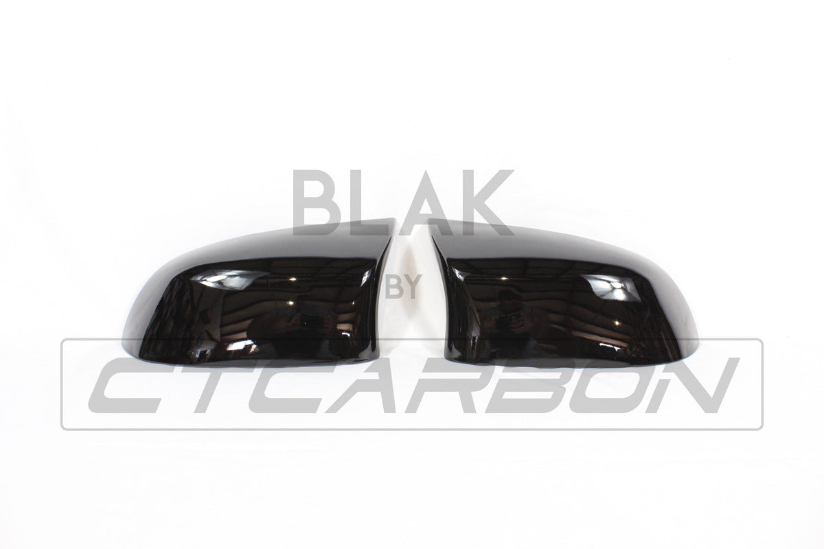 BMW F15/F16 X5/X6 gloss black mirror replacements from CT Carbon, showing sleek, high-gloss black side mirrors for 2014-2018 models.