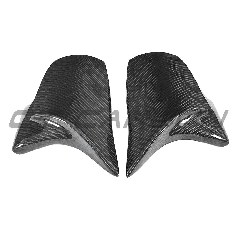 Black carbon fiber mirror covers for BMW F40 F44 1 and 2 Series, CT Carbon replacement accessories, sleek and lightweight design.