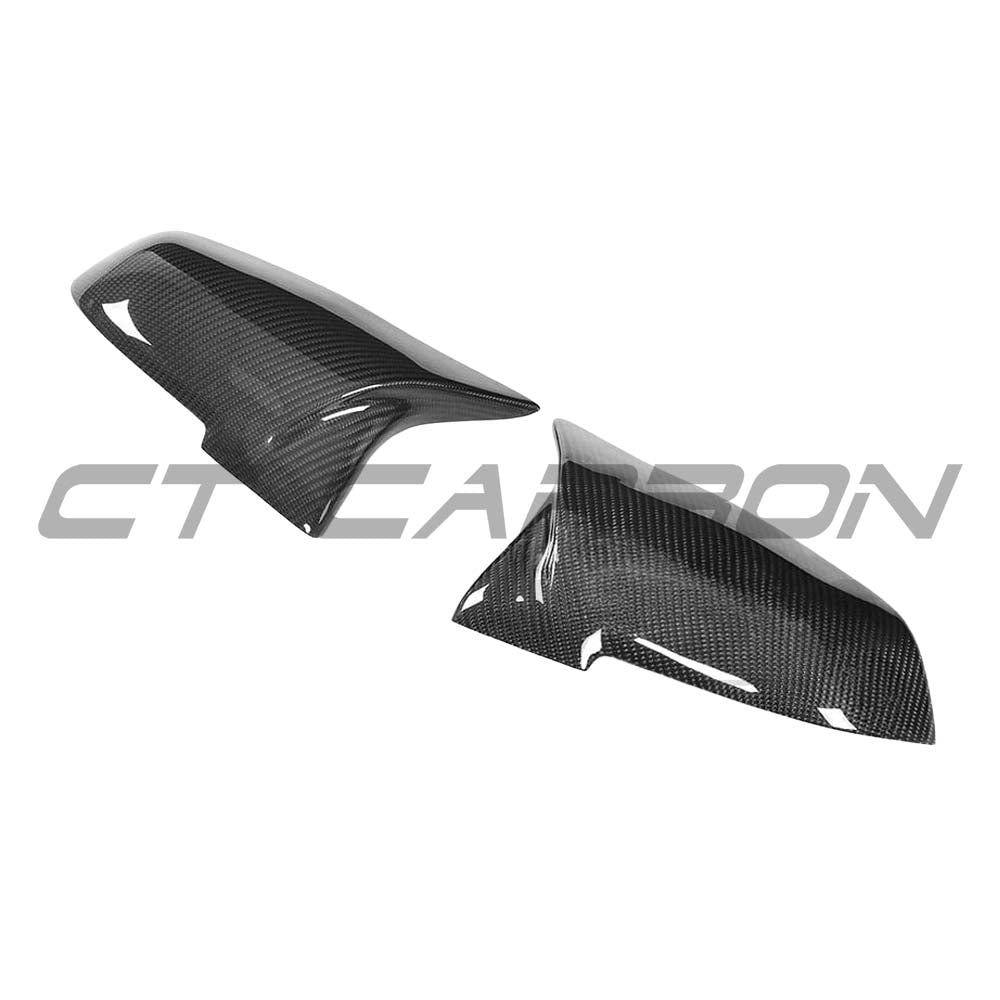 Black carbon fibre mirror covers for BMW F40 F44 1 & 2 Series, replacement accessories by CT Carbon.