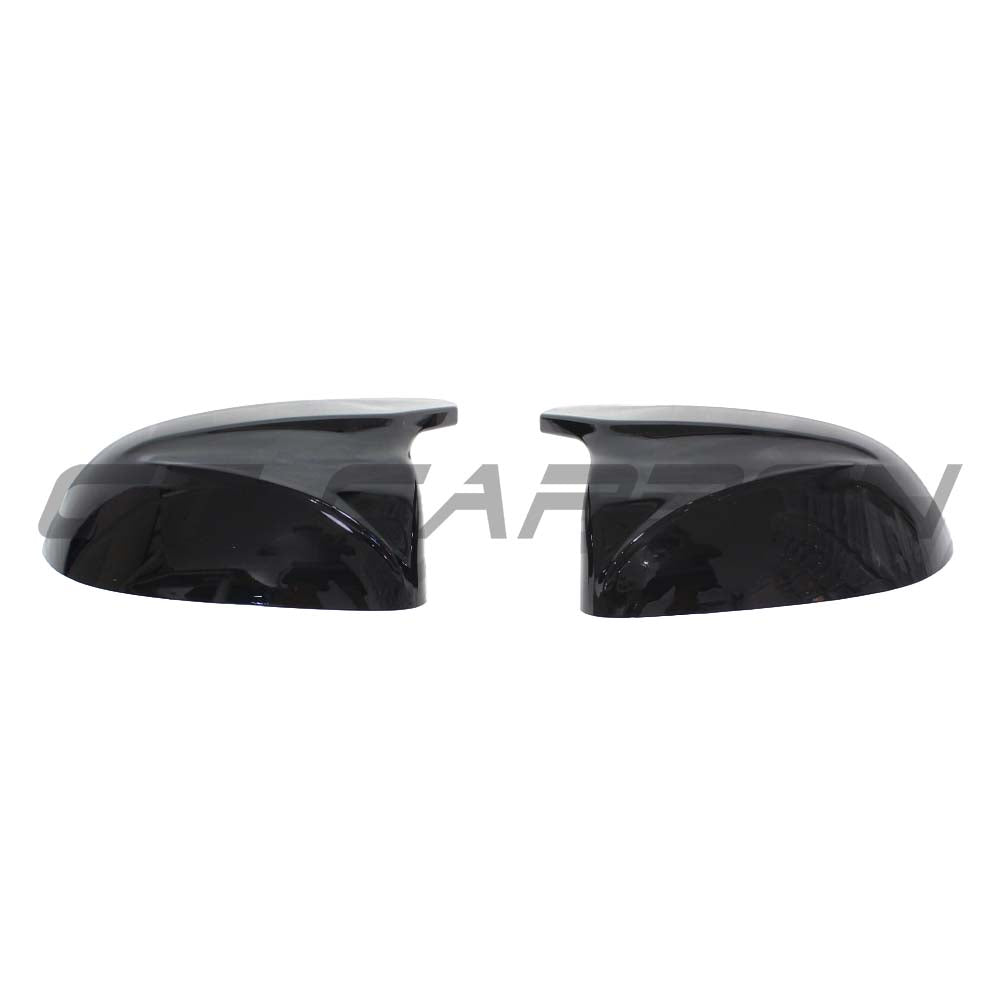 Gloss black BMW X3/X4/X5/X6 G01/G02/G05/G06 mirrors by CT Carbon, featuring sleek aerodynamic design and high-quality finish.