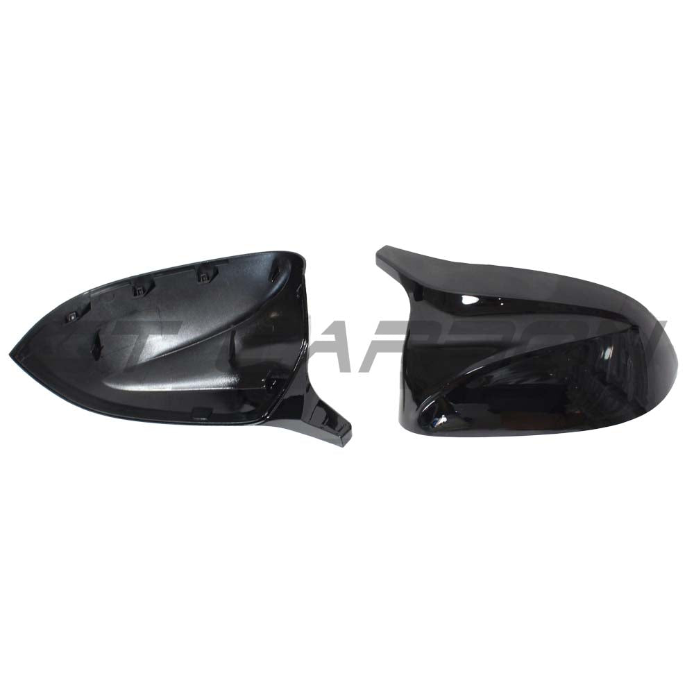 Gloss black BMW X3, X4, X5, X6 G01, G02, G05, G06 carbon fiber side mirrors by CT Carbon, close-up of sleek mirror covers.