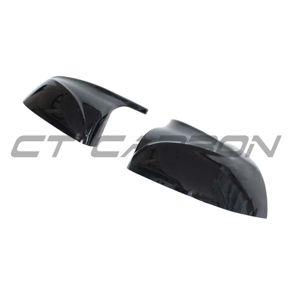 Gloss black BMW X3/X4/X5/X6 G01/G02/G05/G06 mirrors by CT Carbon, featuring sleek, aerodynamic design and high-quality finish.