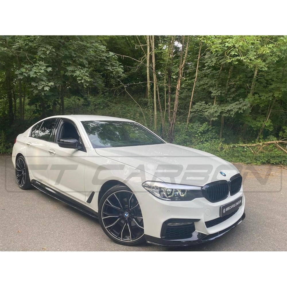 BMW 5 Series G30/31 side skirts in gloss black by CT Carbon, featuring sleek, aerodynamic design for enhanced vehicle style.