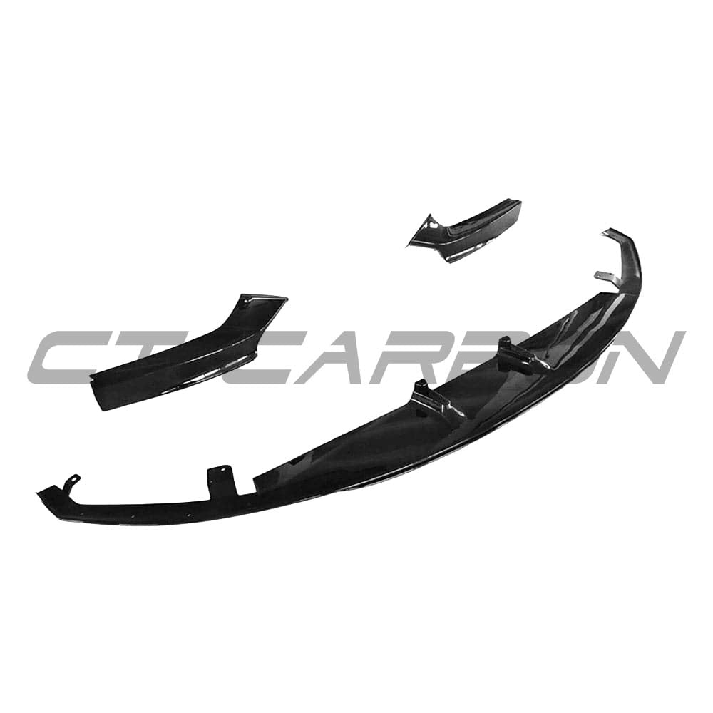 Black BMW 2 Series F22 full kit with twin exhaust, featuring gloss black splitter and MP style accents from CT Carbon.