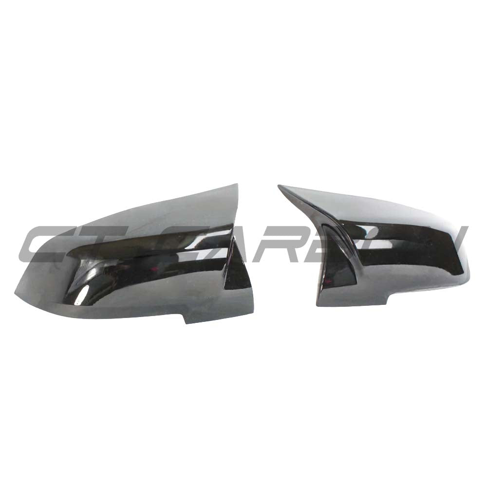 BMW Fxx 1, 2, 3, 4 Series gloss black mirrors by CT Carbon, showing sleek side mirror replacements with a glossy finish.