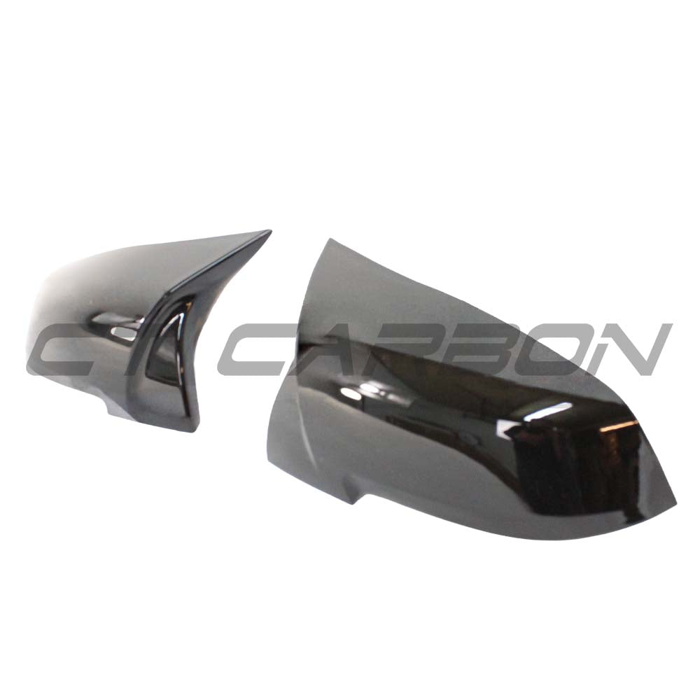 Black BMW Fxx series mirrors by CT Carbon, OEM-style replacement side mirrors for 1, 2, 3, and 4 Series models.