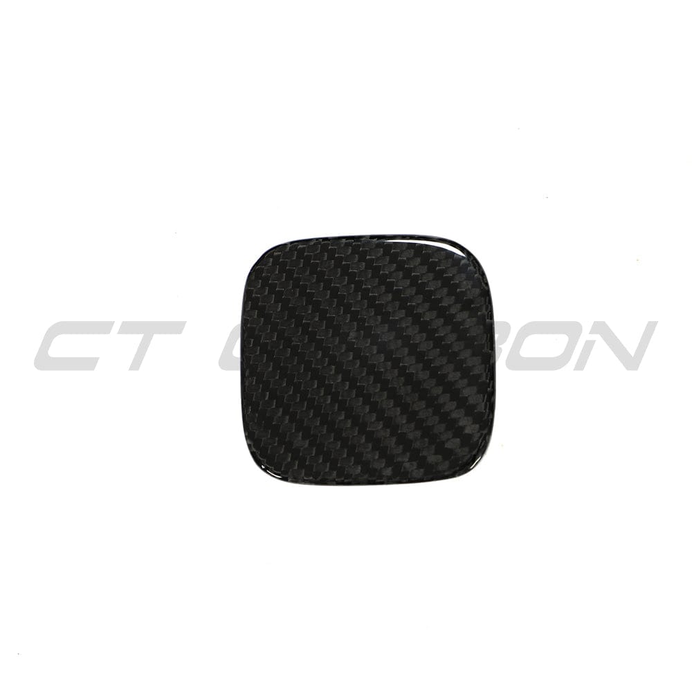 Black BMW G22 4 Series carbon fibre diffuser kit by CT Carbon, showcasing sleek, lightweight carbon fibre components on the vehicle.