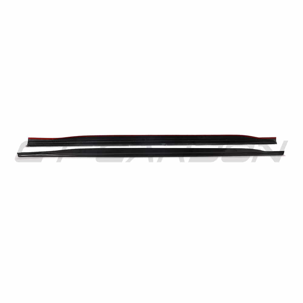 Black BMW G22 4 Series carbon fibre side skirts and diffuser kit by CT Carbon, showcasing sleek, lightweight car enhancement components.