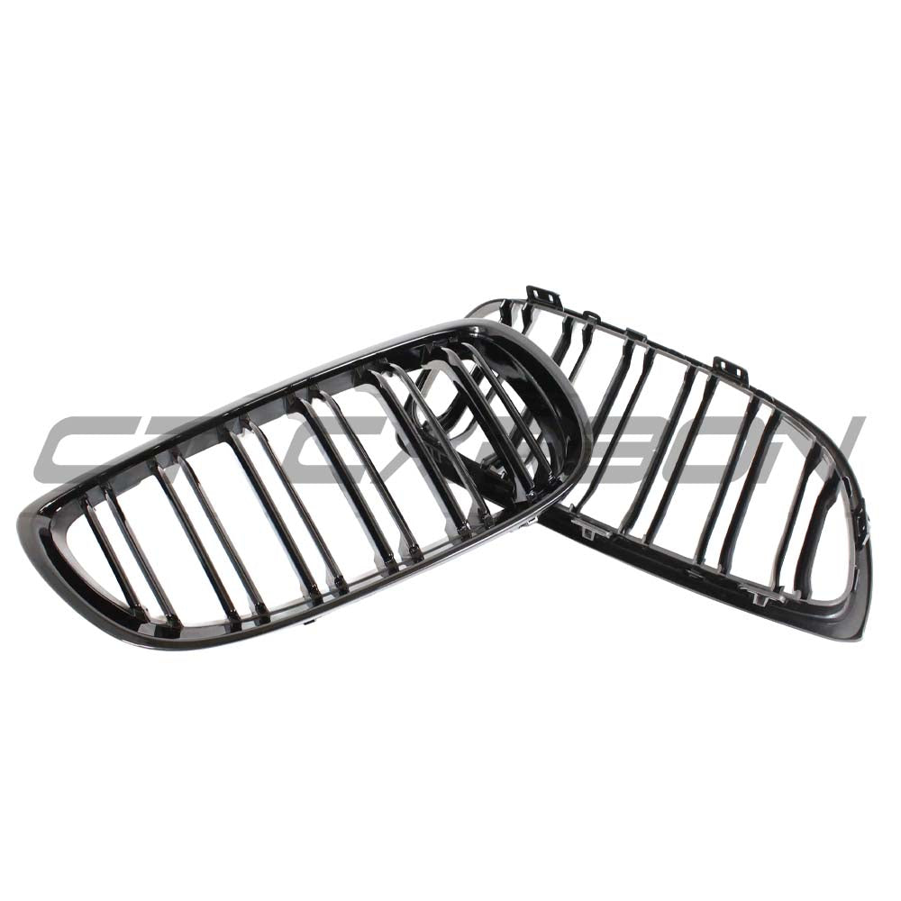 BMW E90 3 Series LCI double slat black grille by CT Carbon, close-up of sleek black grille design for BMW vehicles.