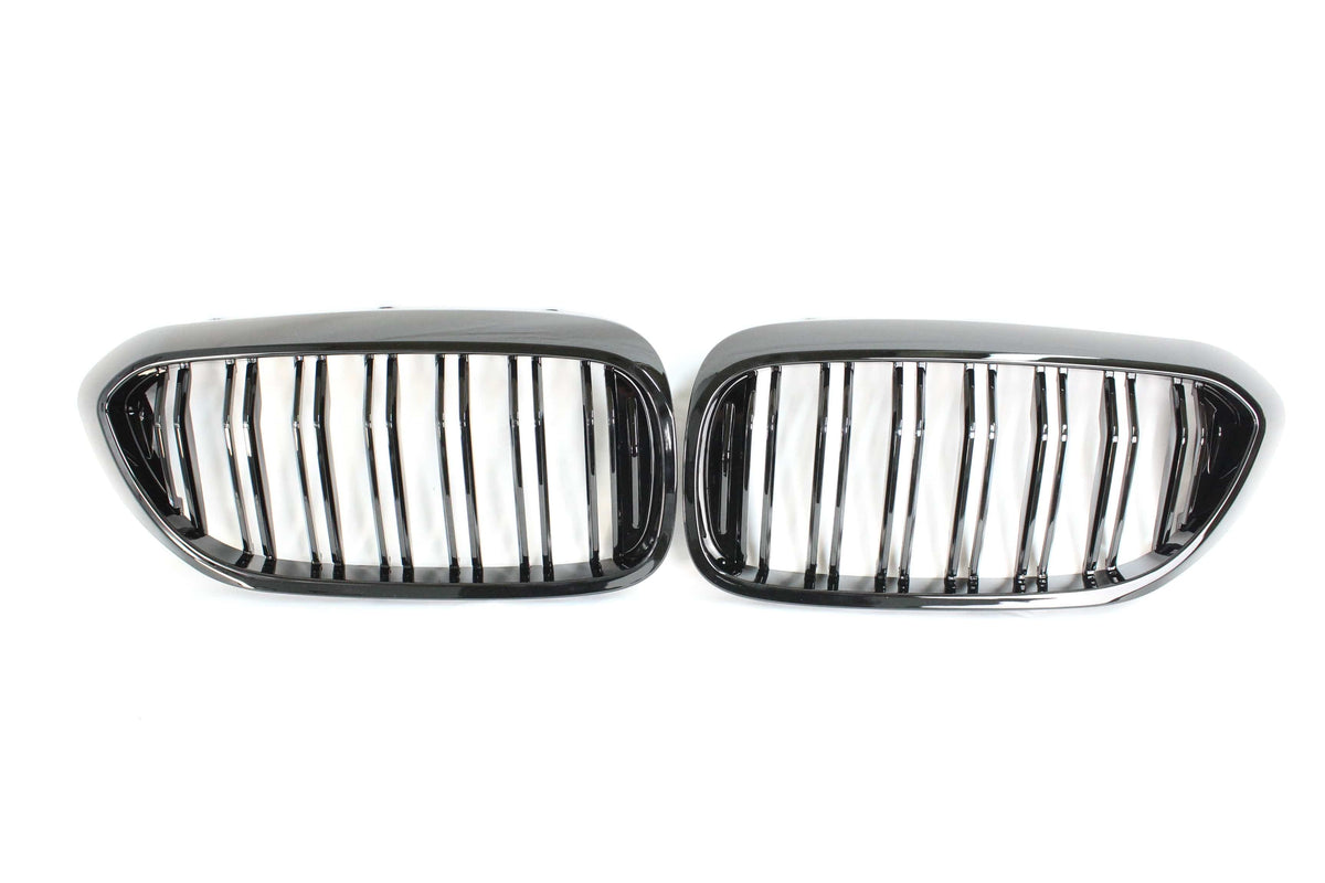 BMW M5 F90 and 5 Series G30 double slat black grille by CT Carbon, showcasing sleek black design and premium vehicle styling.