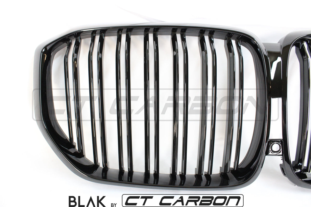 BMW X5 G05 2018+ CT Carbon double slat black grille showing sleek black finish and chrome accents on the grille slats.