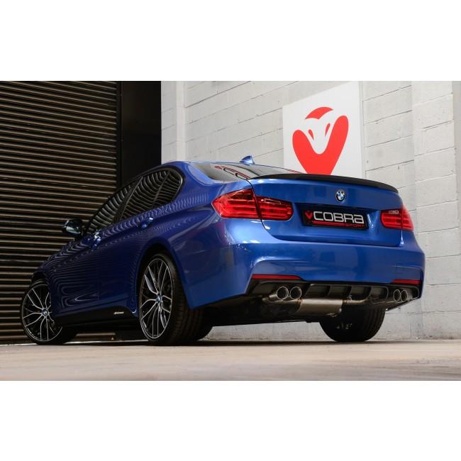 Cobra Sport BMW 330D F30 quad exit M3 style exhaust conversion showing dual exhaust tips on a black BMW F30.
