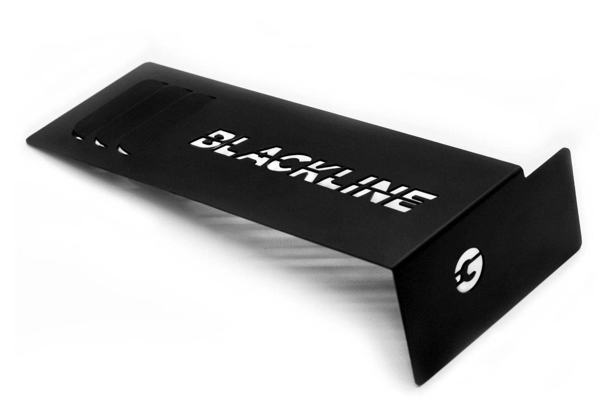 Goldenwrench BMW M2 Competition, M3 F80, M4 F82 charge cooler cover in engine bay trim, showcasing sleek metallic design.