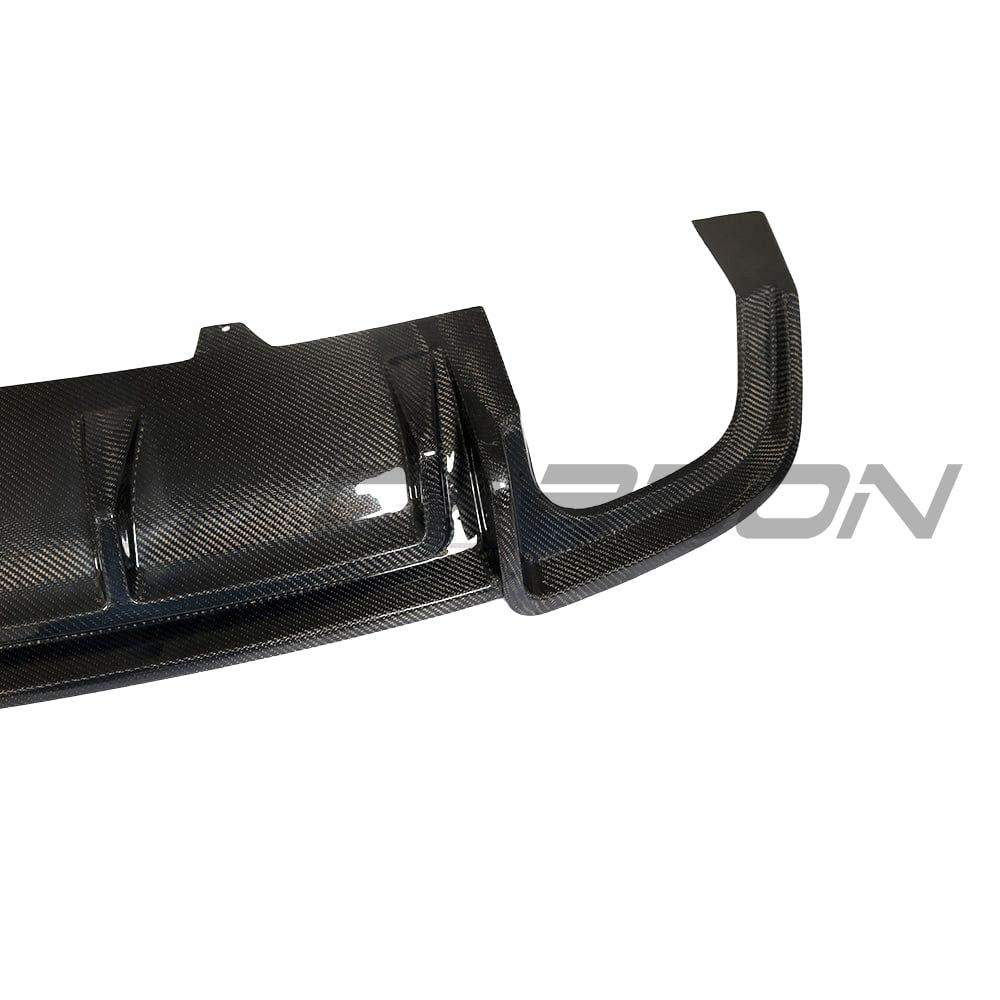 Carbon fibre diffuser for Audi A5 S5 B9 (2017-2021) by CT Carbon, shown installed on the rear of the vehicle.