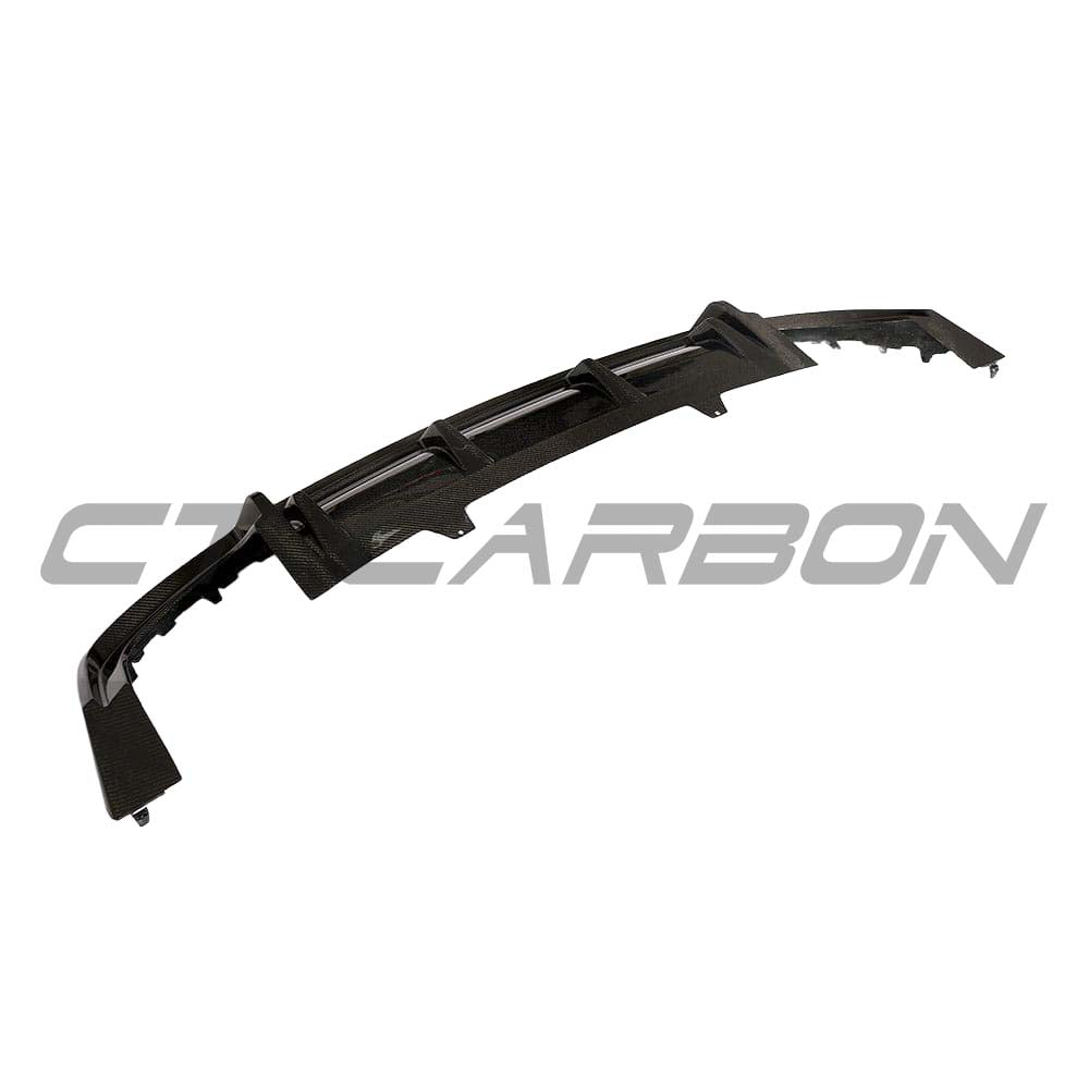 Carbon fiber diffuser for Audi A5 S5 B9 2017-2021 by CT Carbon, showing sleek, textured carbon fiber surface and aerodynamic design.