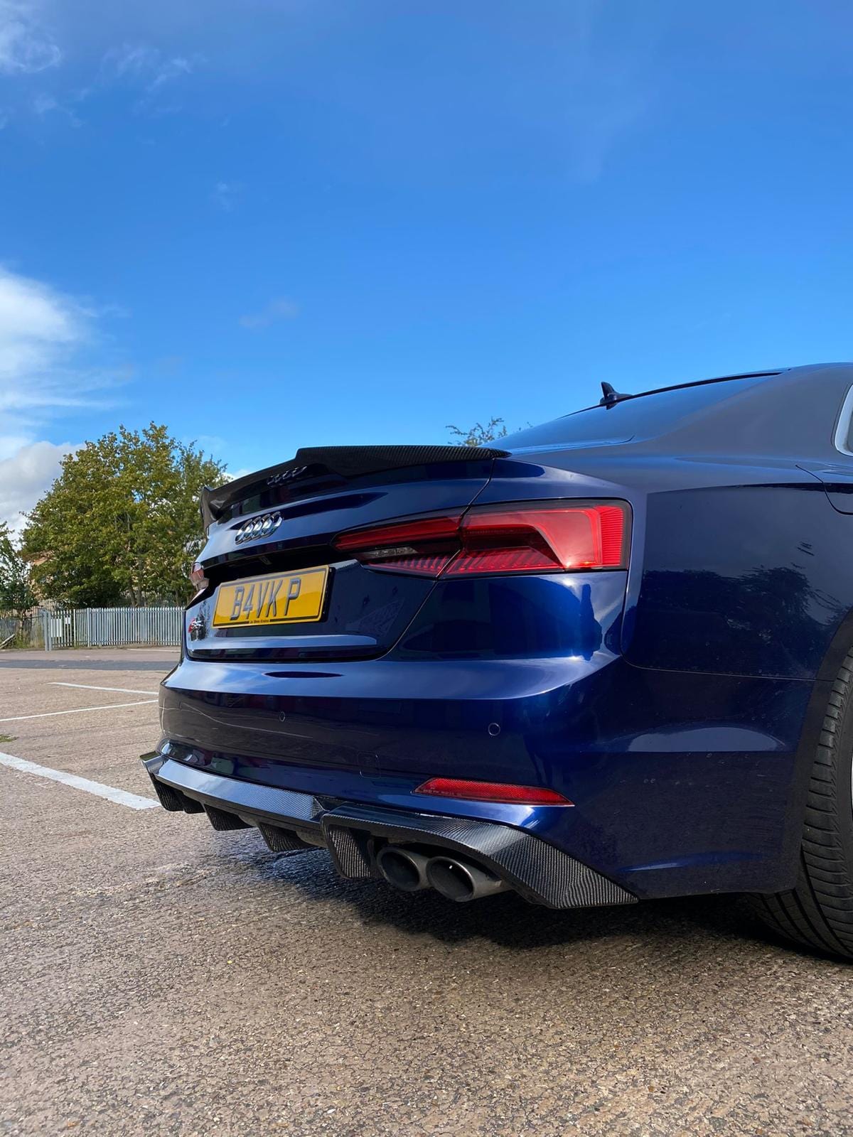 Carbon fibre diffuser for Audi A5 S5 B9 (2017-2021) by CT Carbon, showcasing sleek, textured car rear diffuser design.