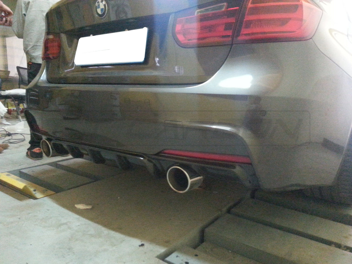 BMW F30/F31 3 Series carbon fiber diffuser by CT Carbon, V2 style with dual exhaust cutouts, sleek performance-enhancing design.