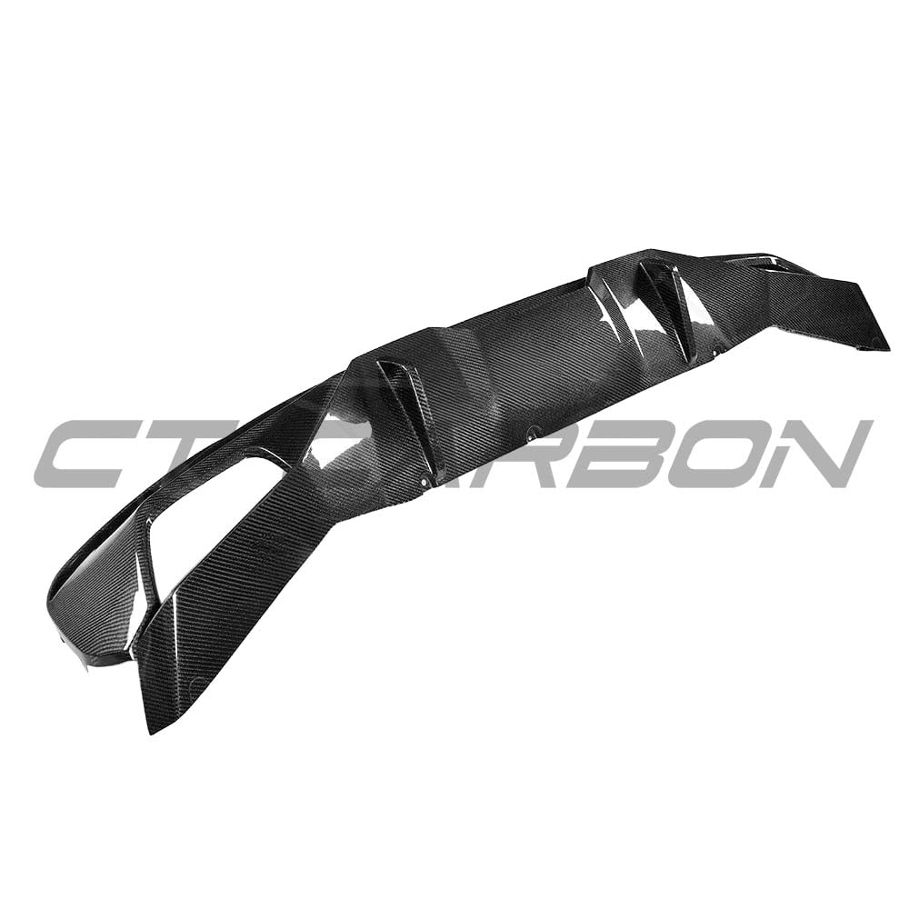 BMW G30 5 Series carbon fibre diffuser by CT Carbon, M Sport style, showcasing sleek aerodynamic design on a modern sedan.