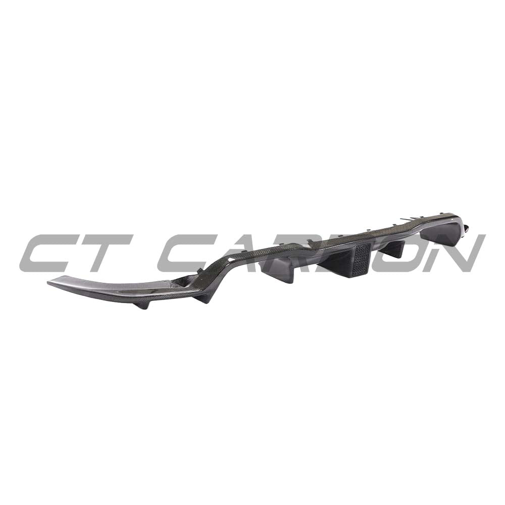 BMW M2 F87 carbon fibre diffuser by CT Carbon featuring a K-style design, showcasing sleek, lightweight automotive enhancement.