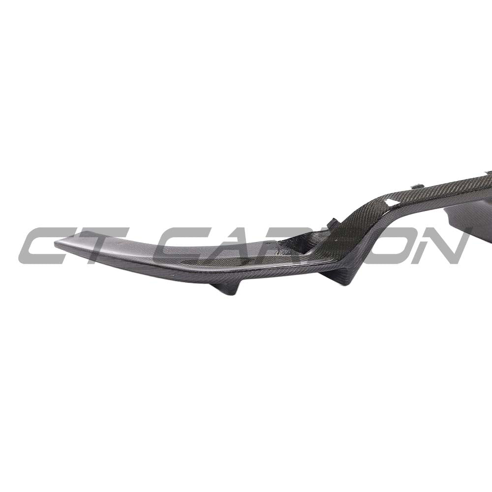 BMW M2 F87 carbon fiber diffuser by CT Carbon, showcasing the sleek K-style design on the vehicle's rear for aerodynamic enhancement.