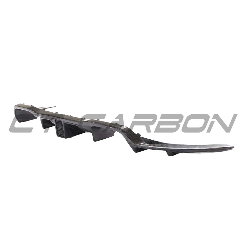 BMW M2 F87 carbon fiber diffuser by CT Carbon, K-style design, showcasing sleek aerodynamic details and high-quality craftsmanship.