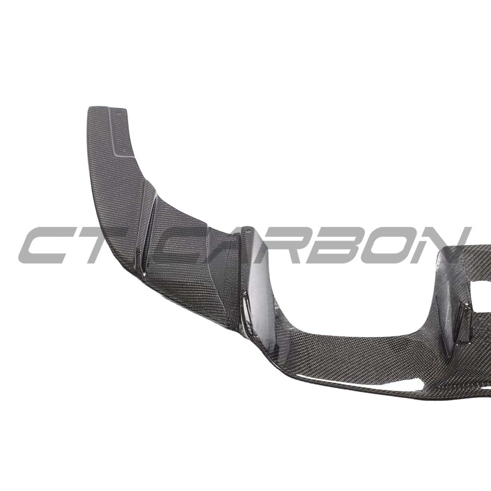 BMW M2 F87 carbon fibre diffuser by CT Carbon, K-style design, showcasing sleek, lightweight construction for improved aerodynamics.