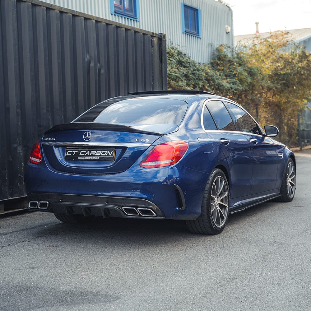 CT Carbon diffuser for Mercedes W205 C63 and C63S saloon, featuring a sleek carbon finish with exhaust tips in PS style.