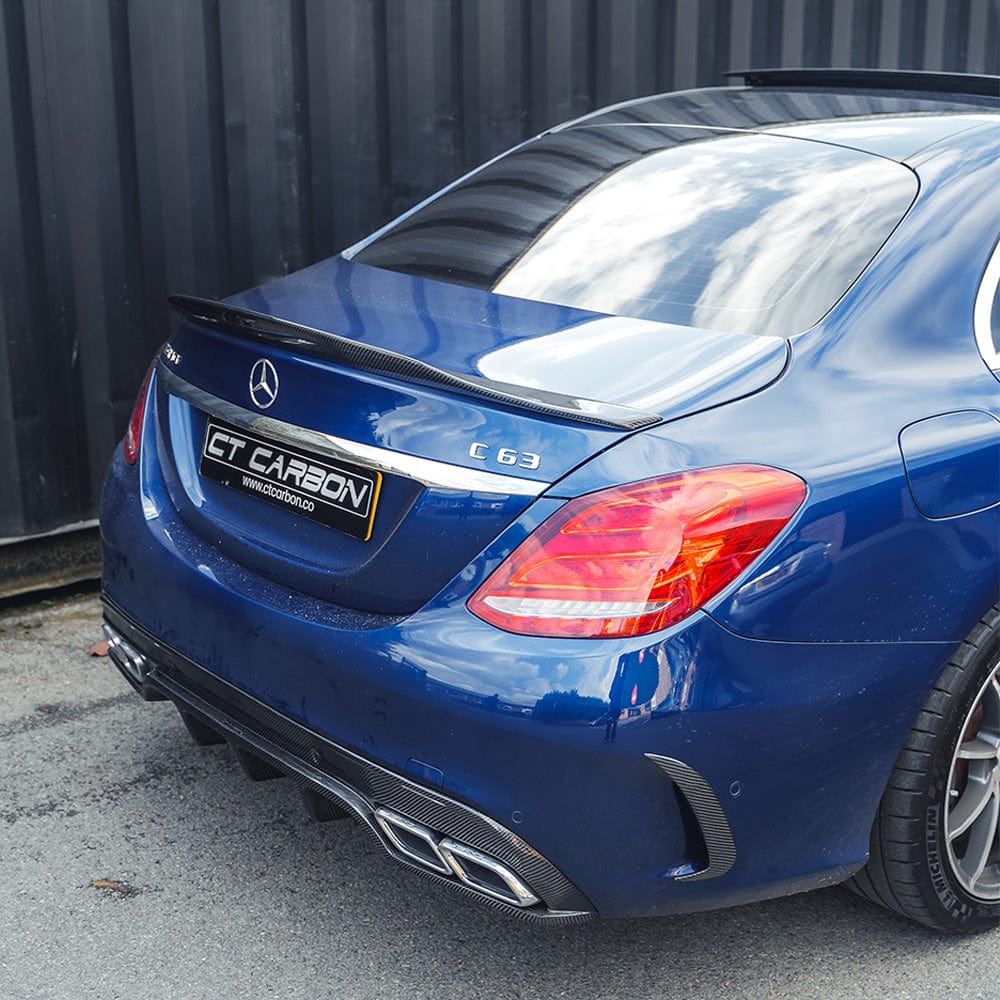 CT Carbon diffuser for Mercedes W205 C63 and C63S saloon, with carbon finish and integrated exhaust tips, PS style.