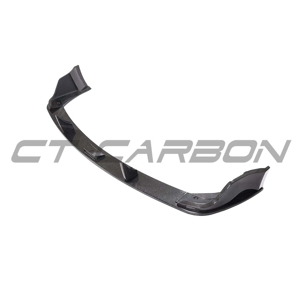 Toyota Supra 2019+ A90 CT Carbon carbon fiber diffuser, lightweight aerodynamic car accessory, installed on the rear underside of the vehicle.