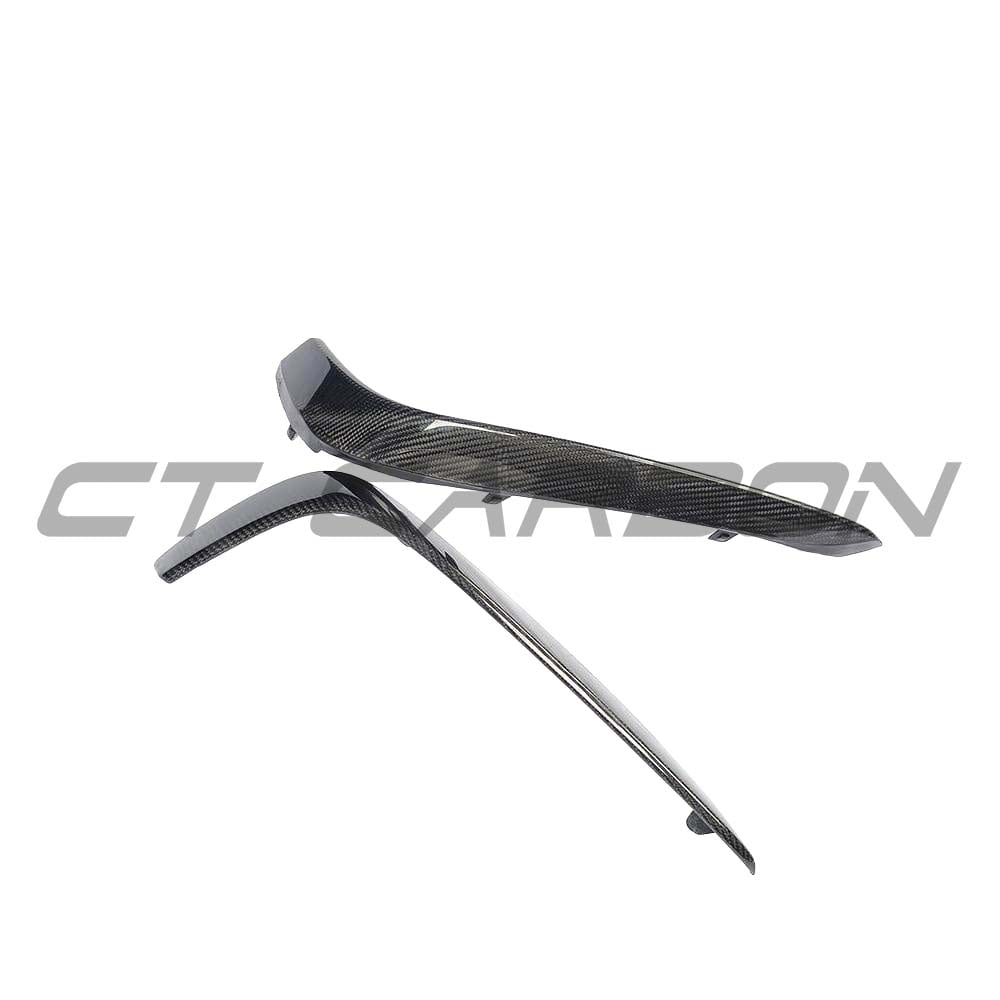 Carbon fibre bumper trim accessory for Mercedes C63 and C63S W205 coupe and saloon, by CT Carbon, shown on vehicle exterior.