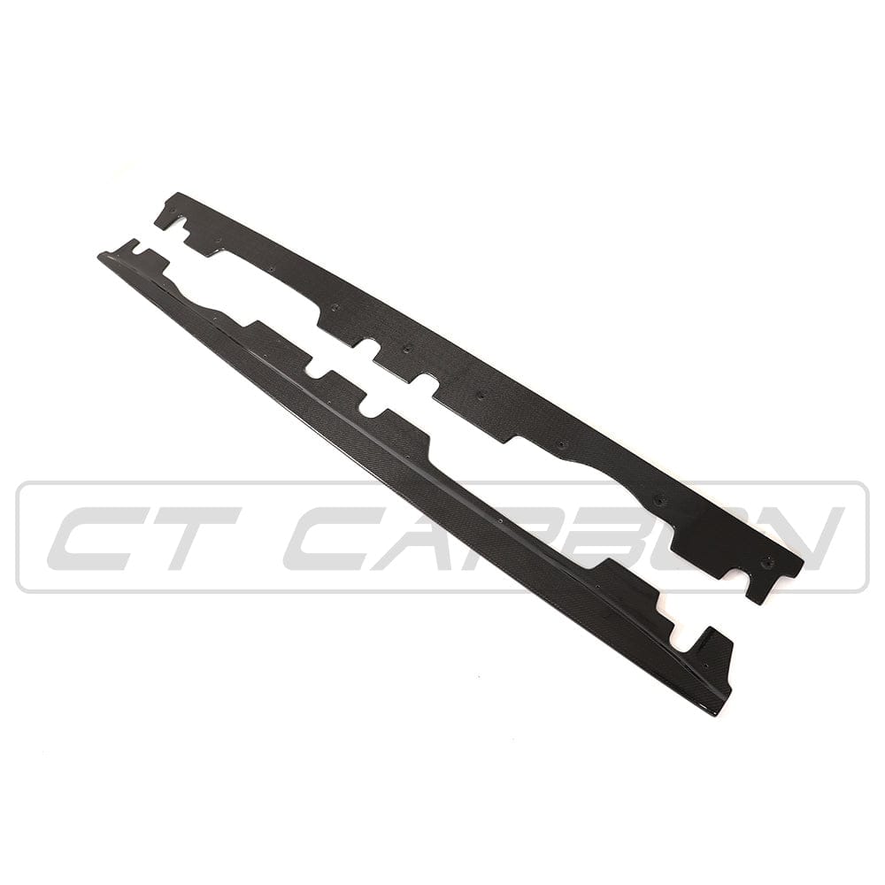 BMW E92 M3 full carbon fiber kit by CT Carbon, including body panels and accessories in sleek carbon fiber finish.