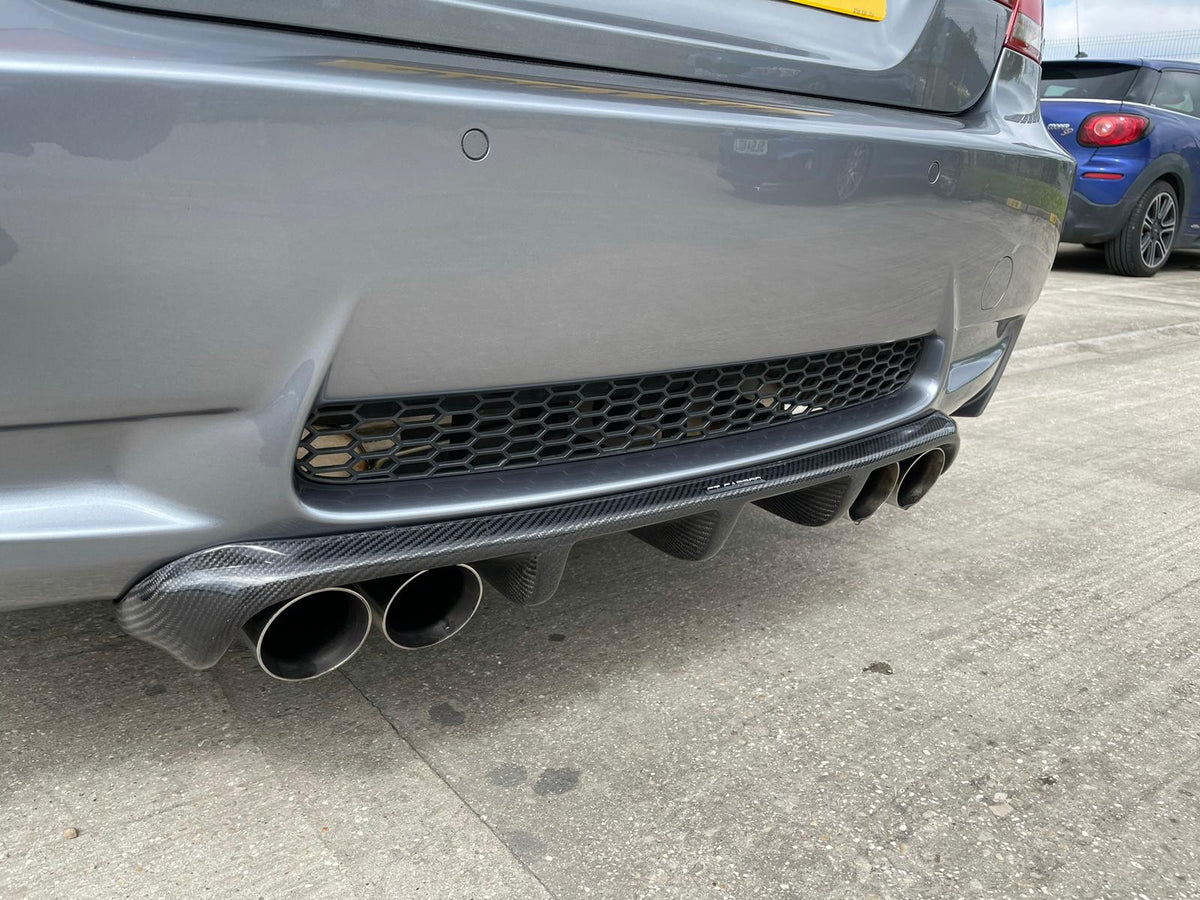 BMW E92 M3 CT Carbon full carbon fiber kit, V2 style, showcasing lightweight, glossy carbon fiber panels on the full car.