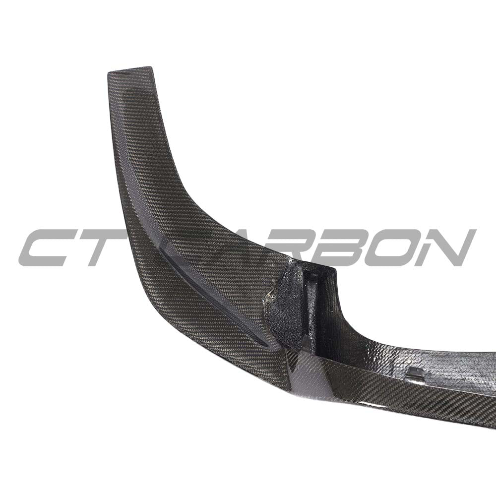 BMW F87 M2 CT Carbon full carbon fiber kit installed, showcasing lightweight, sleek carbon fiber panels on the car.