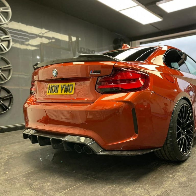 BMW F87 M2 (OG) full carbon fibre kit by CT Carbon, featuring V3 forged carbon fibre components on a sleek sports car.