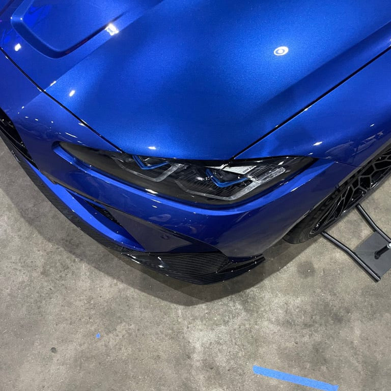 BMW G82 M4 full carbon fibre kit by CT Carbon, including hood, roof, and side panels, showcasing sleek carbon fibre design.
