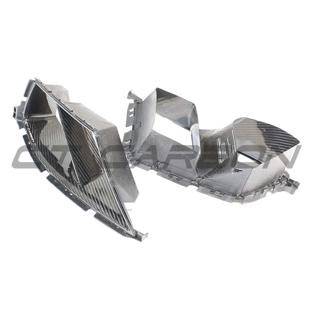 BMW M3 M4 G80 G82 G83 carbon fibre front end pack by CT Carbon with bumper ducts and aerodynamic enhancement.
