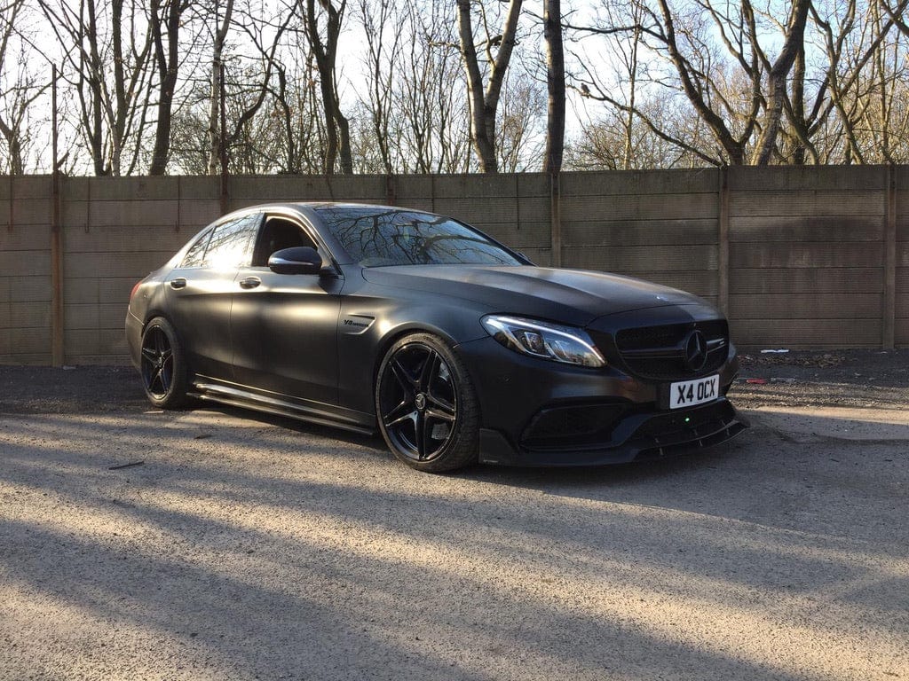 Full Mercedes C63 W205 saloon carbon fibre kit by CT Carbon, including body panels and accents in DTM style.