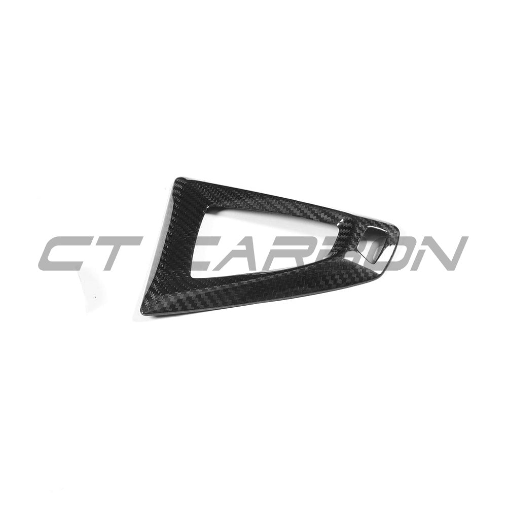 BMW FXX M car DCT shifter surround in carbon fiber by CT Carbon, RHD interior accessories with detailed close-up view.