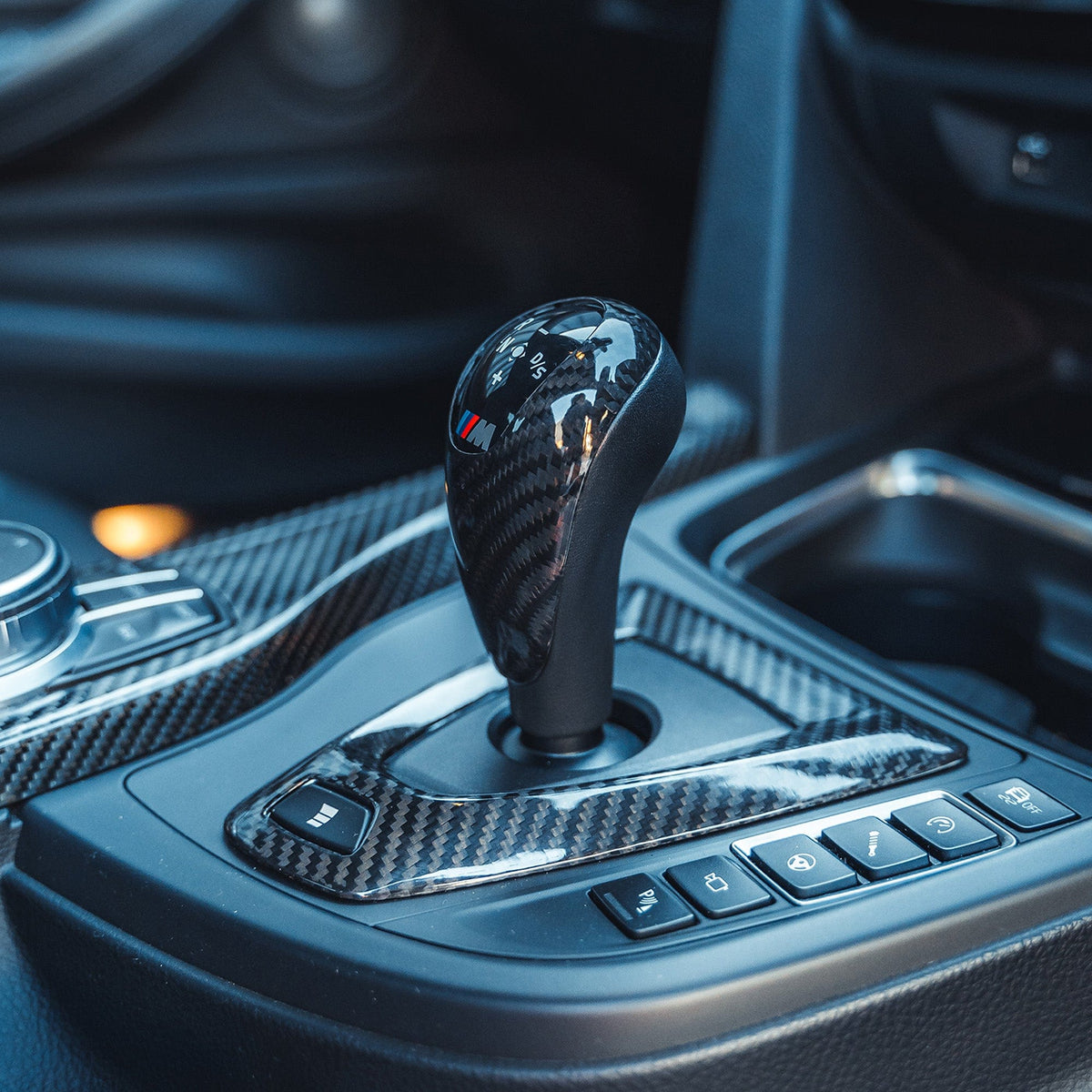 BMW Fxx M car DCT shifter and surround set by CT Carbon, RHD interior accessories with carbon fiber finish.