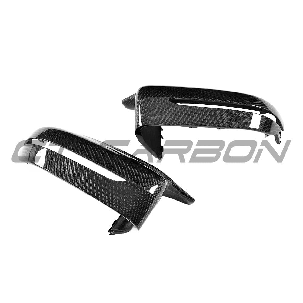 BMW 3, 4, 5 Series G20/G21/G22/G26 G30/G31 CT Carbon fiber LHD mirror replacements, close-up of sleek carbon fiber side mirrors.